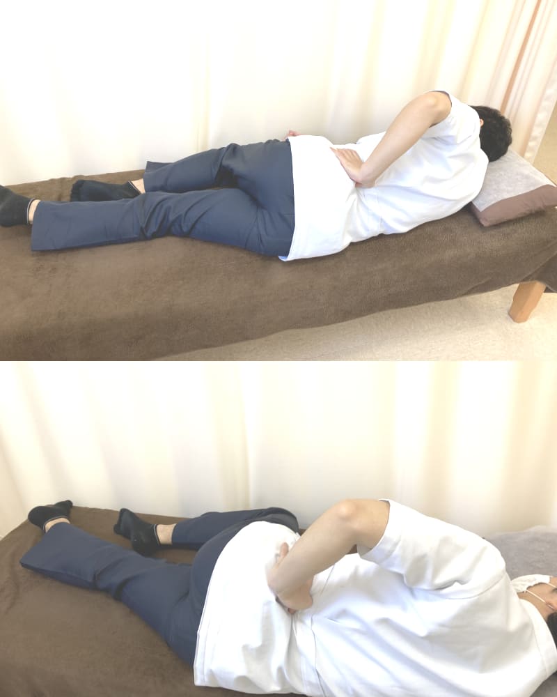 上山和俊が左腰の後ろの痛みを改善する腰方形筋を指圧している写真